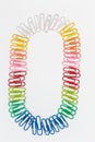 Number zero null made from color rainbow paper clips on white