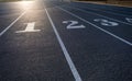 Numbered Lanes of a Track and Field Starting Point Royalty Free Stock Photo