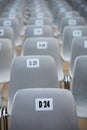 Numbered and reserved chairs for a music event