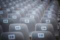 Numbered and reserved chairs for a music event