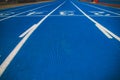 Numbered running track blue color. Starting position.