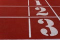 Numbered stadium running tracks. Numbers and lines on jogging runway.