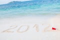 Numbers 2012 on tropical beach sand Royalty Free Stock Photo