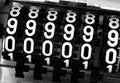 Numbers of an analog meter with the inscription 999999