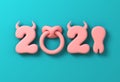 2021 With Numbers As Bull Horns, Hoof And Nose Ring On Blue Background. Concept Of Chinese New Year Of The Ox. Royalty Free Stock Photo