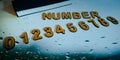 numbers displayed on water drop abstract background with diary Royalty Free Stock Photo