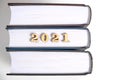 Numbers in form of two thousand twenty first year on spine of book