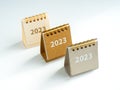 2023, numbers of new year on various eco earth tone colors small desk calendars in beige, yellow and grey colors.