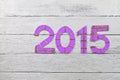 Numbers 2015 on a silver painted clapboard Royalty Free Stock Photo