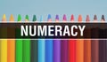 Numeracy concept with education and back to school concept. Creative educational sketch and numeracy text with colorful background