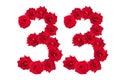 Numeral 33 made of red roses on a white isolated background. Element for decoration. Thirty three. Red roses Royalty Free Stock Photo