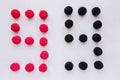 The numeral nine is written in black and red on a white background