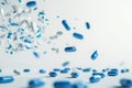 Floating blue and white capsules in abstract motion. Neural network AI generated Royalty Free Stock Photo