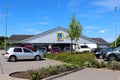 Parking lot with cars and street lights at Aldi Sud in Germany