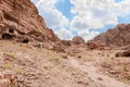 Numerous caves carved into the rocks in the Nabatean Kingdom of Petra in the Wadi Musa city in Jordan Royalty Free Stock Photo