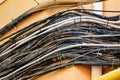 Numerous electrical wires on the facade of the building Royalty Free Stock Photo