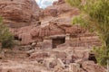 Numerous man made caves carved into the rocks in the Nabatean Kingdom of Petra in the Wadi Musa city in Jordan Royalty Free Stock Photo