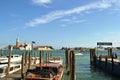 Numerous motorboats anchored at the San Marco pier in Venice.