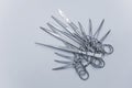 Numerous surgical instruments on a blue gray background Royalty Free Stock Photo