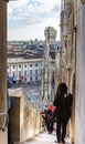 Numerous tourists descend the stairs from the roof of the Cathedral of Milan - Duomo di Milano in Milan city, Italy