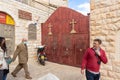 Numerous tourists near the gate in the St. Marys Syriac Orthodox Church in Bethlehem in the Palestinian Authority, Israel Royalty Free Stock Photo