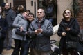 Numerous tourists are photographed in the courtyard of Juliet`s house. People make selfies Royalty Free Stock Photo