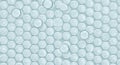 Numerous translucent glass marbles are evenly arranged in a tight pattern Royalty Free Stock Photo