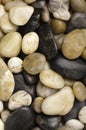 Numerous types of worn river rock