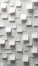 Numerous white square sticky notes create textured abstract pattern on clean wall surface. Blank papers offer space for Royalty Free Stock Photo