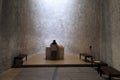 A nun at an alter inside the Notre Dame du Haut chapel in Ronchamp, France Royalty Free Stock Photo