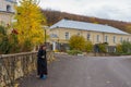 Nun at the convent greets visitors. A public place for pilgrimage, a landmark. October 24, 2021 Kalarashovka Moldova Royalty Free Stock Photo