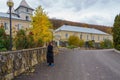 Nun at the convent greets visitors. A public place for pilgrimage, a landmark. October 24, 2021 Kalarashovka Moldova Royalty Free Stock Photo