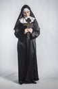 Nun with cross Royalty Free Stock Photo