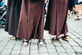 Nun feet in crowd