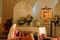 Nun kneeling in adoration of the Blessed Sacrament Royalty Free Stock Photo