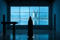Nun, a member of a religious community leading a nun& x27;s life. member of a religious community, praying to God and
