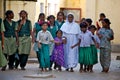 Nun with orphan children in India