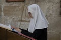 A Nun Praying in Jerusalem