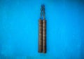 Nunchaku weapon isolated on Blue background. Black nunchaku training for beginner. Hot Tactical Gear Martial Arts Equipments