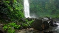 Nungnung waterfall. Famous tourist destination. Bali, Indonesia.
