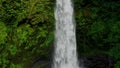 Nungnung waterfall. Famous tourist destination. Bali, Indonesia.