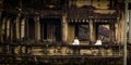 Nuns meditate on the ruin of Angkor Wat at sunrise