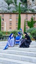 Nuns and novices on the steps of the temple talk and laugh; a trip to the Montserrat mountain;