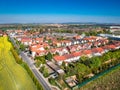 Nupaky, Czech republic. April 24, 2019. New row houses with old part of village in background near Prague