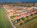 Nupaky, Czech republic. April 09, 2019. New row houses with old part of village in background in spring