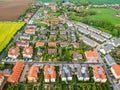 Nupaky, Czech republic - May 20, 2019. New row houses with old part of village in background