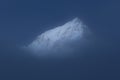 Nuptse Peak Above The Cloud in Moonlight, Nepal.