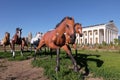 NUR-SULTAN, ASTANA, KAZAKHSTAN - JUNE 3, 2015: Monuments of seven horses of brown and white colors are running in front