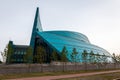 Kazakhstan Central Concert Hall green and blue modern glass building.