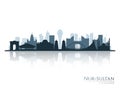 Nur-Sultan skyline silhouette with reflection.